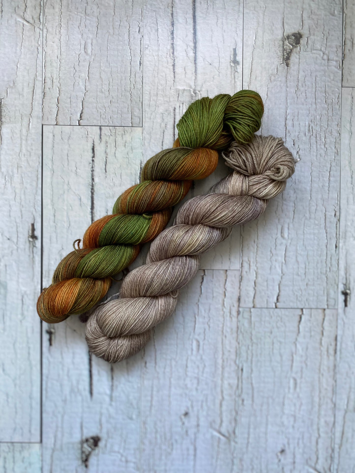 Two Skeins of Everyday Fingeringing, Fallen Leaves on the left and Nut Brown Hare on the Right.  